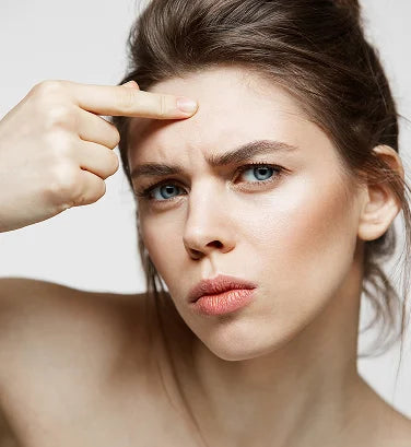 Is Your Hair Oil Breaking Out Your Forehead? The Hidden ‘Pomade Acne’ Problem